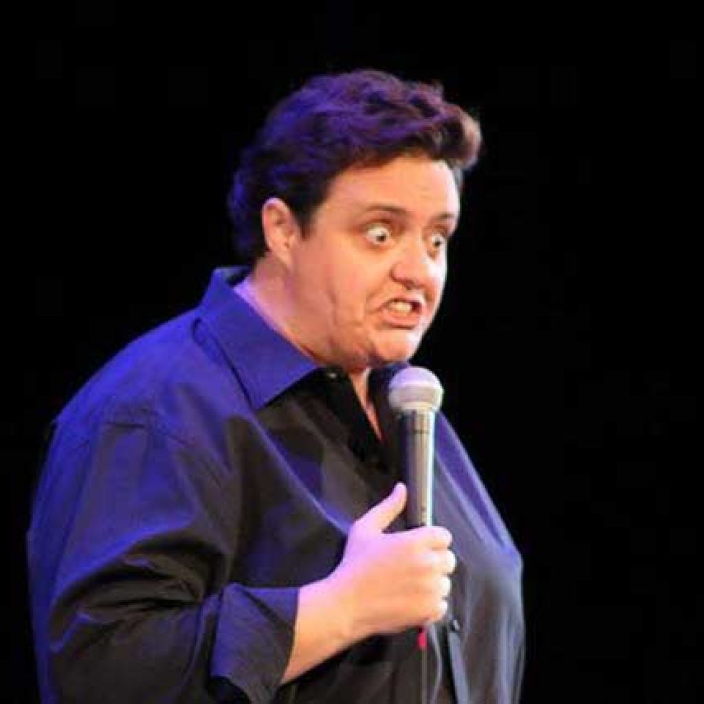 Photo of comedian Jess Miller on stage